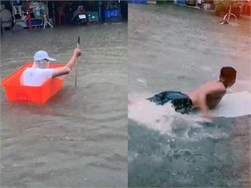 雨彈狂炸高雄多處淹水！民眾苦中作樂　划船、游泳、水上騎腳踏車樣樣來