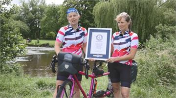 英國兩女以雙人腳踏車環球 遇火災.豪雨險阻仍創紀錄