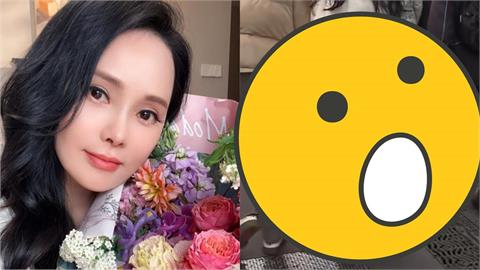 57歲伊能靜緊牽老公秦昊放閃！下秒「大衣吊牌沒剪」竟遭中網罵爆：最討厭這種