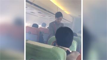 遠航降落「機艙突竄濃煙」 旅客被嗆到咳嗽