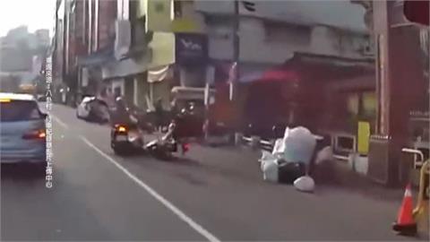 騎士路口撞2大包垃圾慘摔車　警調閱監視器是「他」放的