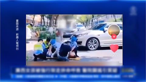 強摘器官？　中國女被5醫護抬走狂喊「我有肝炎」影片瘋傳