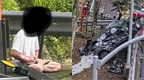 國道休旅車追撞噴飛護欄！駕駛下秒「路肩淡定打坐」詭異畫面全場看傻了