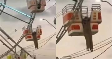 以為摩天輪停了！　女跌出車廂「掛30公尺空中」崩潰：我要掉下去了