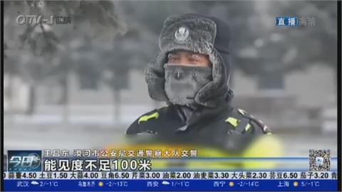 中國寒流南北都發威　黑龍江零下48度　交警兩套衣服上陣