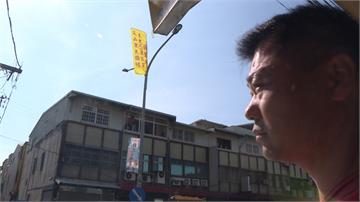 新竹候選人出奇招  旗幟放路燈最上面