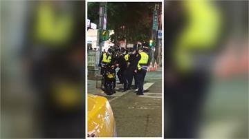 糾紛報警想先走 騎士遭警攔慘摔