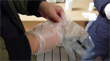 南韓選舉日防疫森嚴 民眾戴口罩、塑膠手套投票