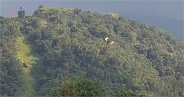 南投虎頭山飛行傘驚險「空中相撞」 2人雙雙墜樹林幸自行脫困