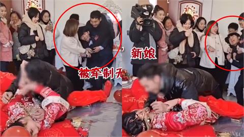 中國又見低俗婚鬧！新娘慘遭男賓客「撲倒索吻」　新郎一旁苦笑