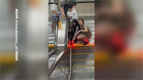 女子長裙捲入北捷手扶梯　有驚無險！幸民眾按停機鈕助脫困