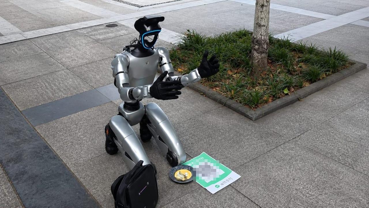 連「乞討」都要AI代勞？路邊驚見機器人「跪求電費」網笑翻：被搶飯碗