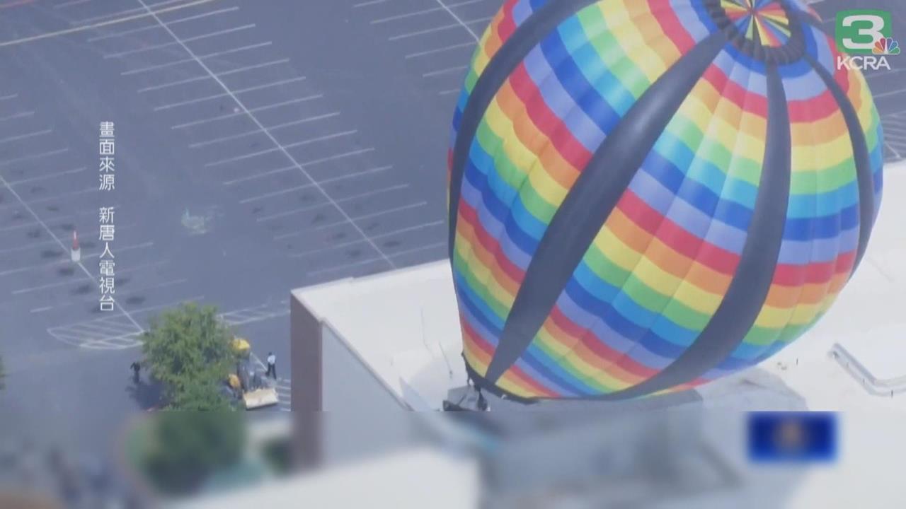 驚險！加州熱氣球飛行表演　一路撞牆又撞電線