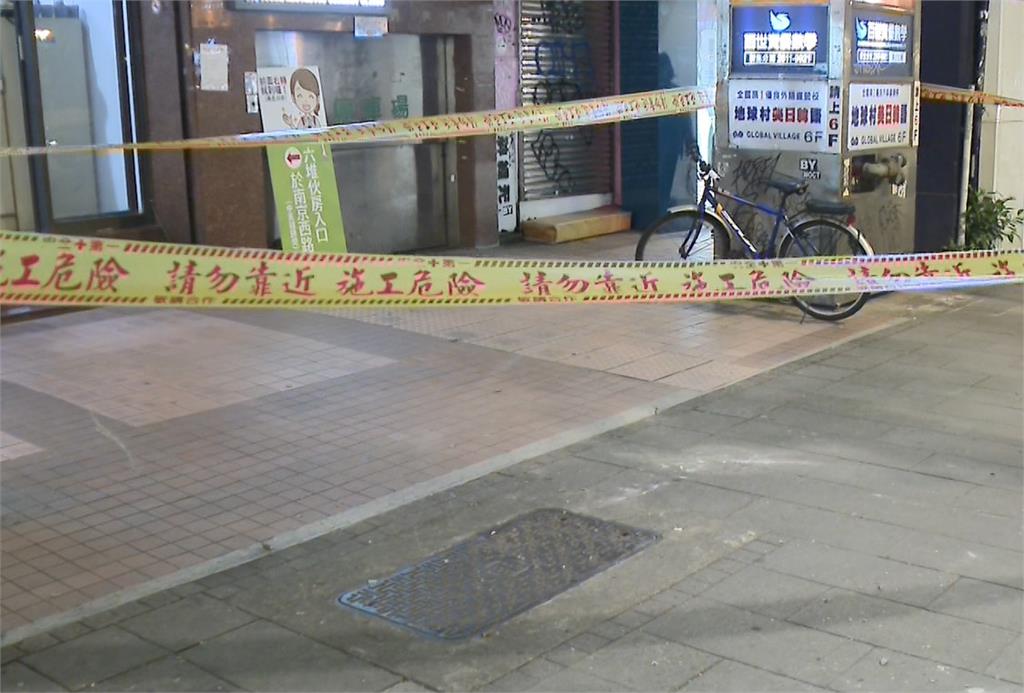 驚！北市中山區大樓突「天降落石」　路人險遭砸傷