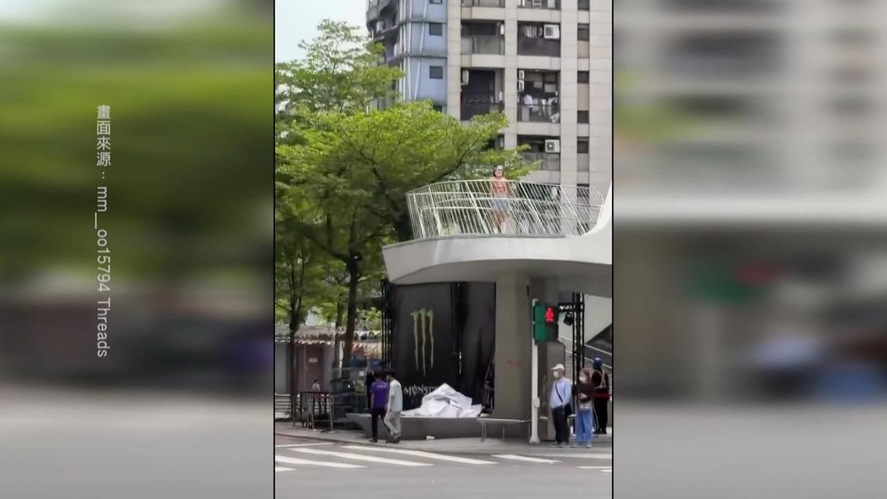 獨家／台北中山商圈驚見「面具女」　站觀景台不動