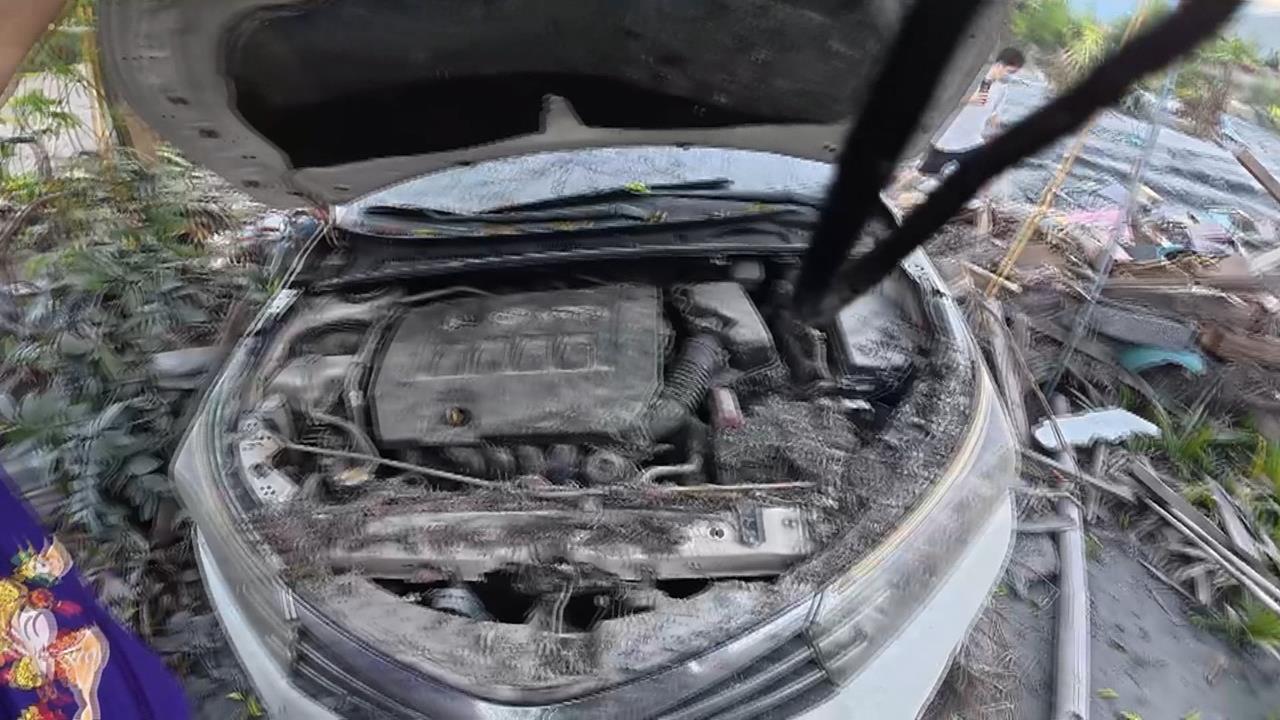三重洗車業者化身「洗車超人」　前進光復清理泡水車
