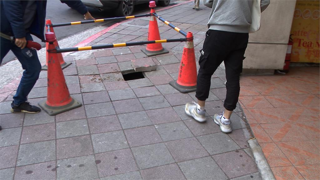 天母人行道驚見黑洞　地磚下陷害他踩空擦傷