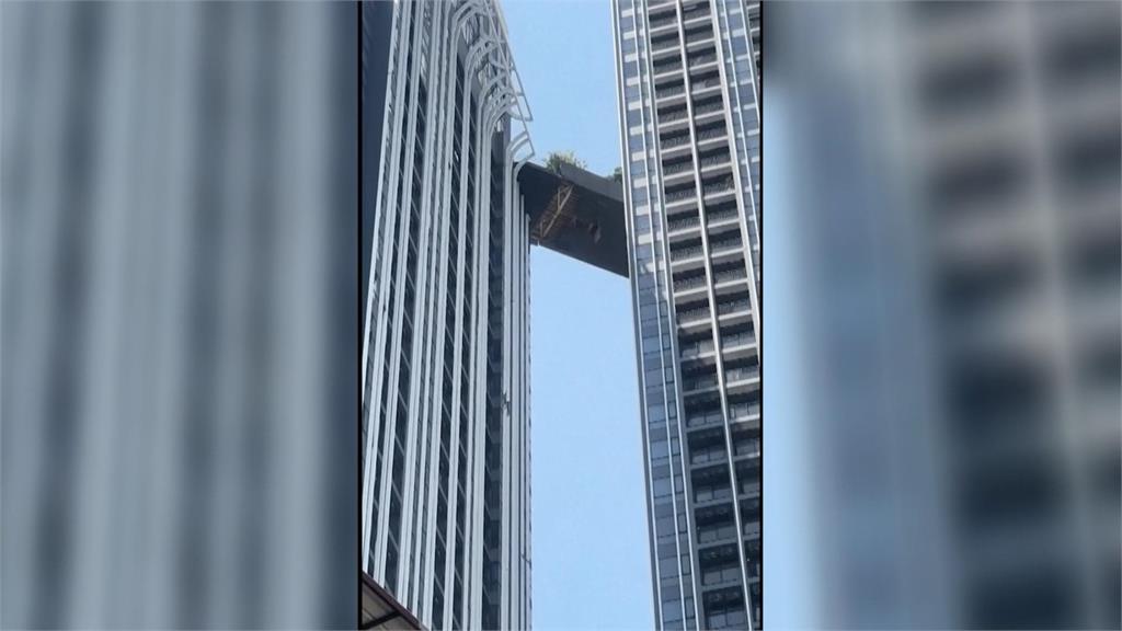 緬甸強震生死一瞬間！　南韓爸救妻女成「空中飛人」　跳過大樓裂縫
