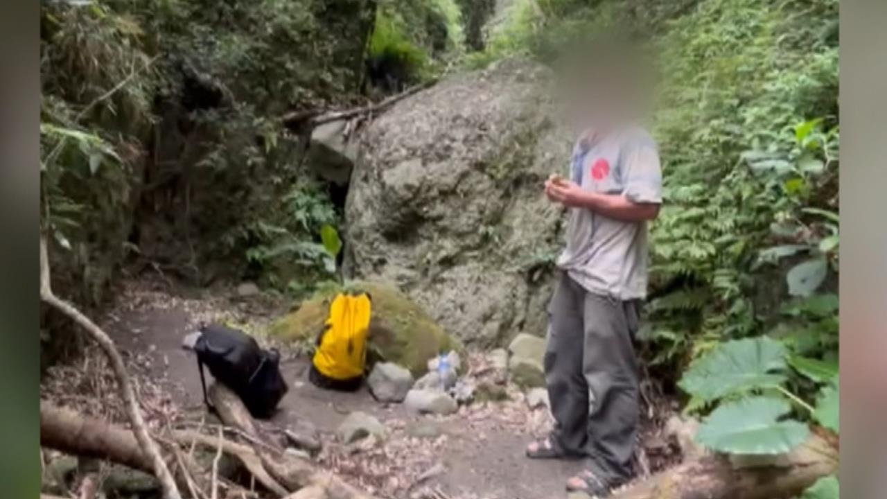 澳洲女婿負氣爬山卡峭壁隙縫　看到空拍機吹薩克斯風回應