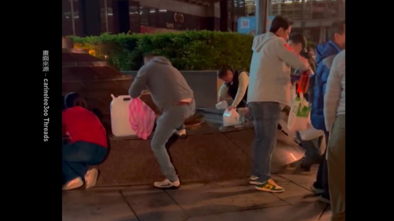 發財水？　101風水池驚見"舀水大隊"　　命理師：不會招財"嘸效"