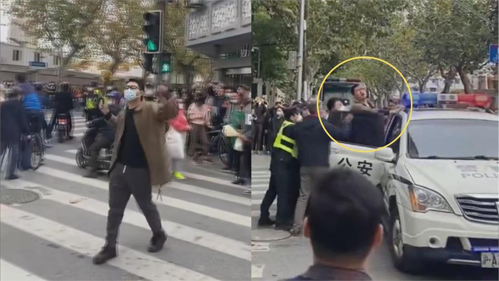 高喊「中國人勇敢一點」！上海男舉花抗議遭警圍攻　民眾怒吼：放開他