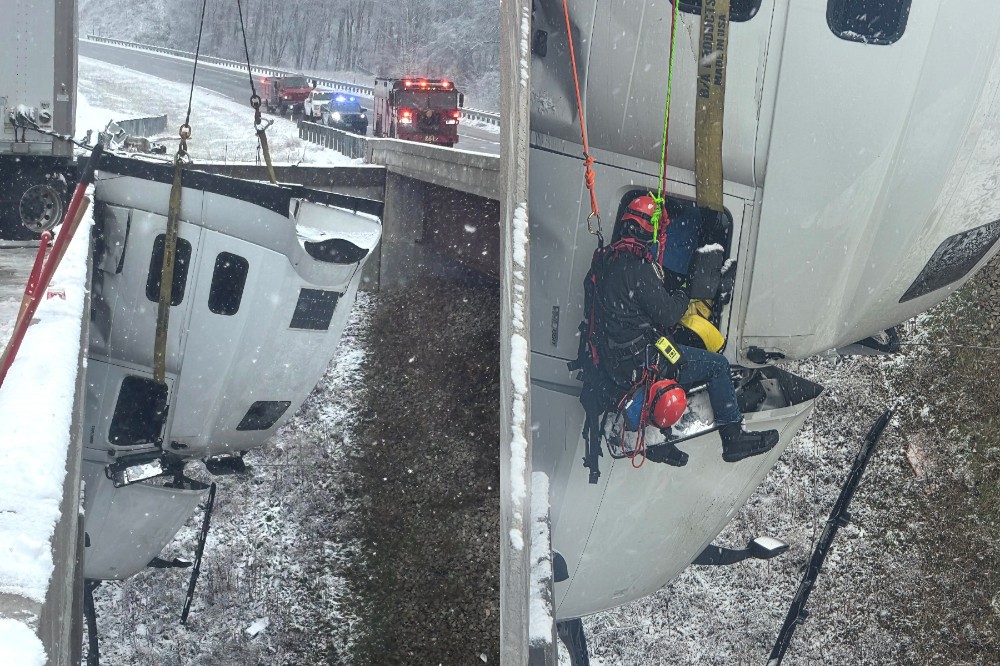 【有片】美聯結車頭懸空掛橋外逾5小時 駕駛靠1.8萬公斤磚塊保命