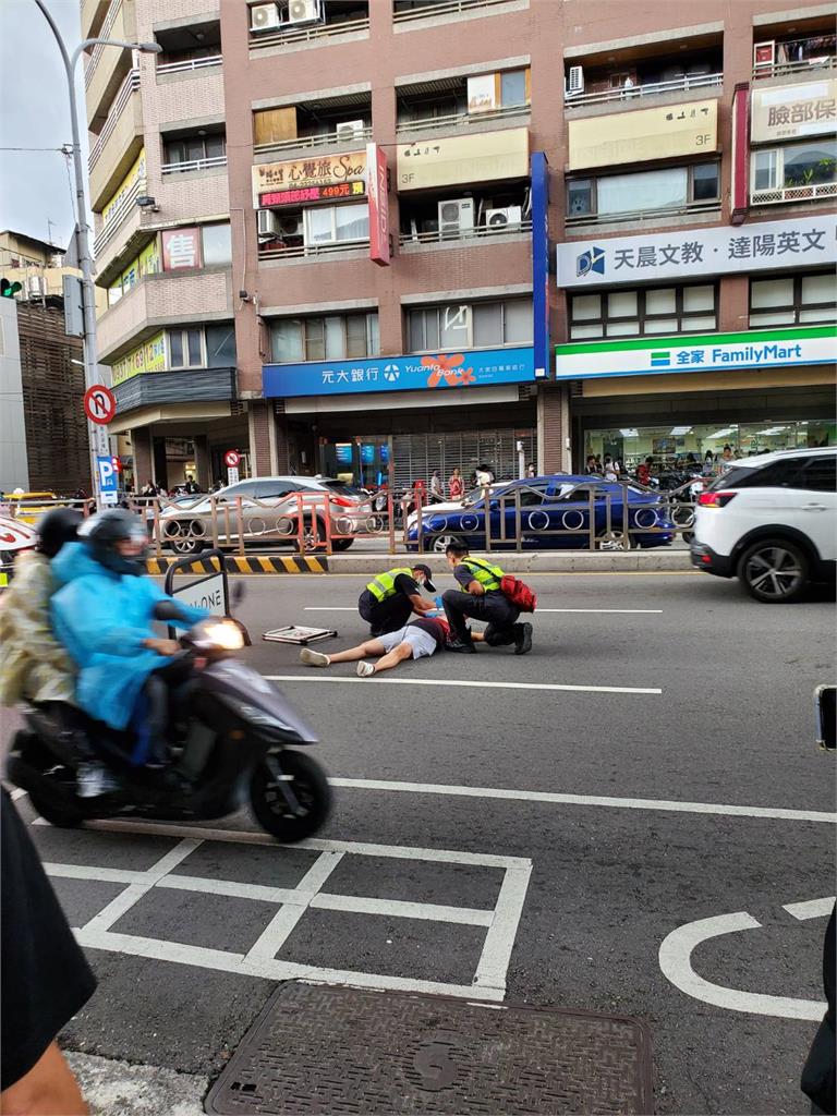 疑癲癇身體不適！台中女子馬路上翻滾　用路人嚇傻急報警