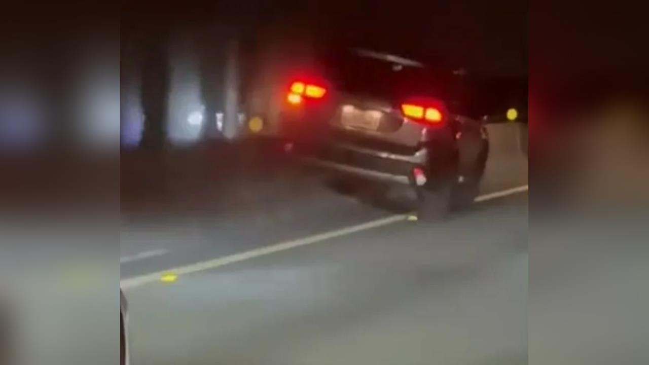 驚險!國道一號「表演特技」? 駕駛身體不適開上護欄飛簷走壁