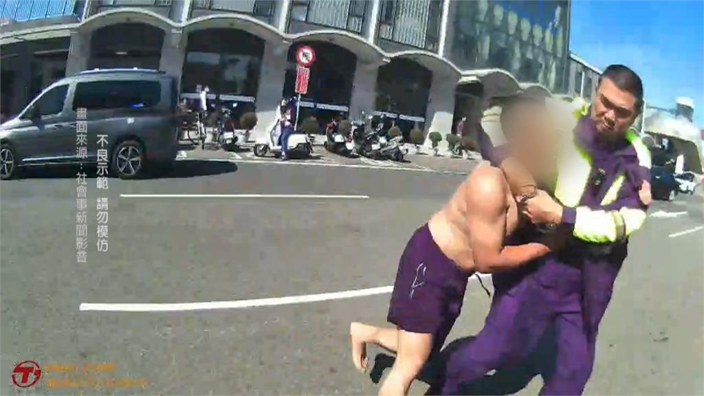 醉男打赤膊街頭大鬧 2警大外割+剪刀腳壓制