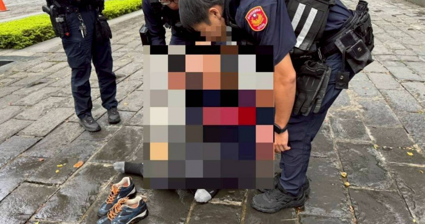 男子三立電視門外抱瓦斯桶揚言自焚　警消急灑水壓制