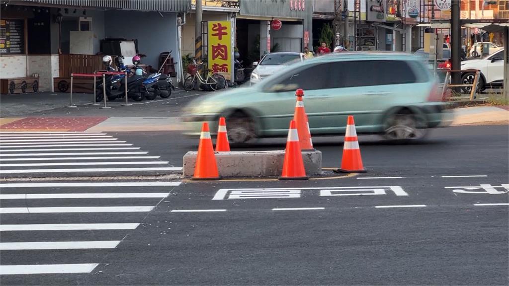 水泥庇護島保障行人安全　壓縮汽車行駛空間