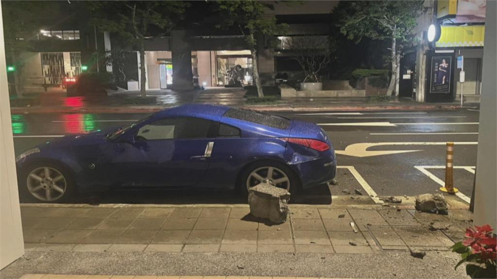 被剝落水泥砸中！日系跑車板金嚴重凹陷