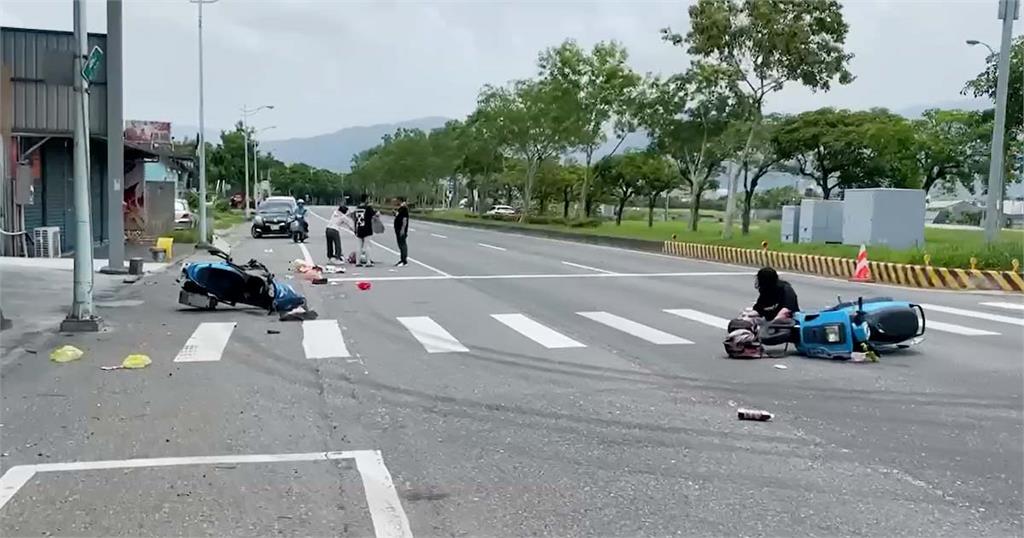 快新聞／暖心！ 女騎士烈日車禍被撞飛倒地　路人幫撐傘遮陽