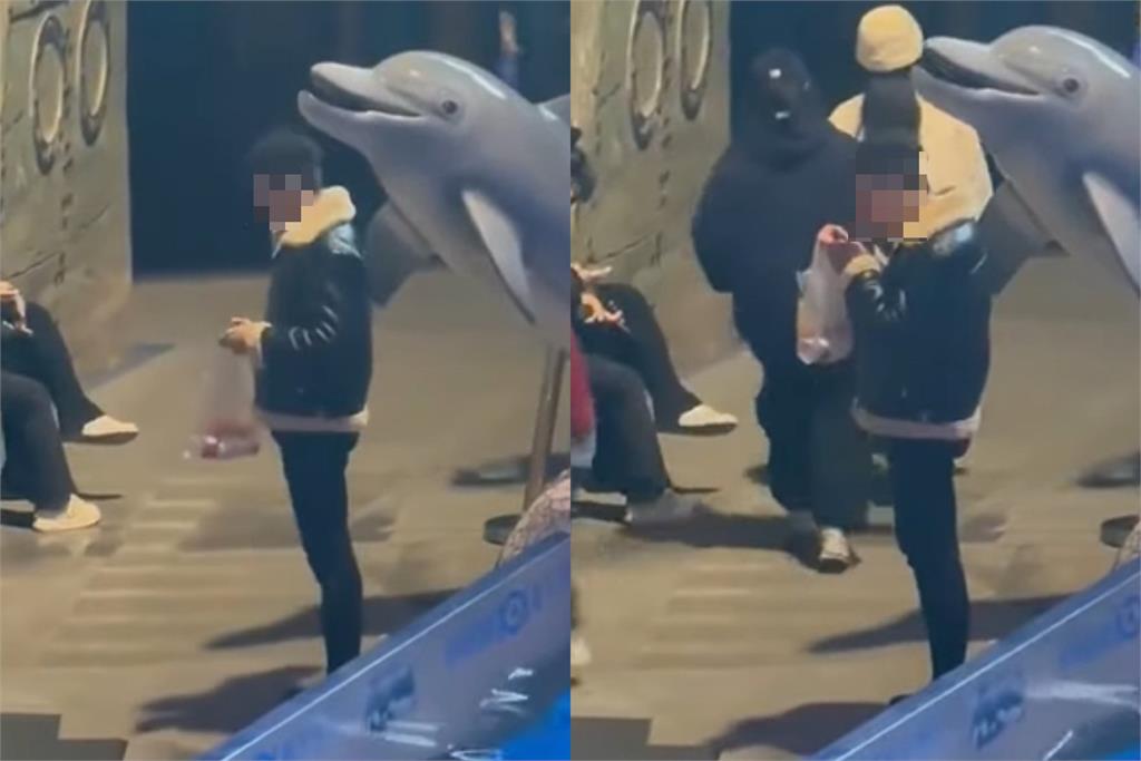 中國男水族館內抽菸不聽勸！小白鯨火大「噴水處罰」當場濕透丟臉畫面曝