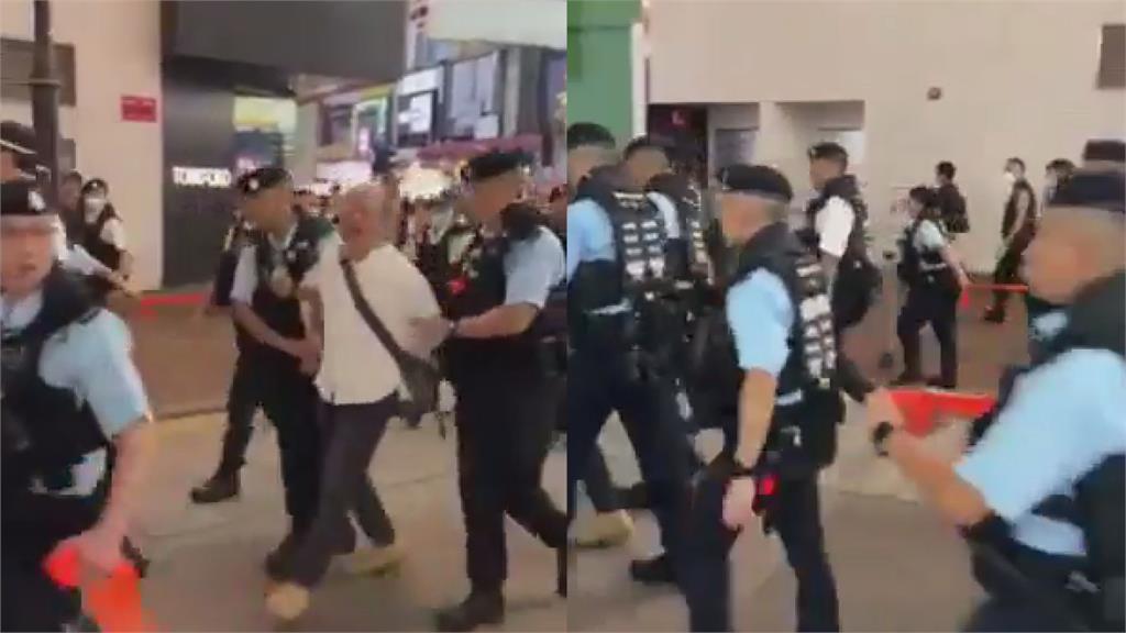 連白紙都沒拿！香港藝術家朝空氣比劃「8964」　下秒被警包圍逮捕