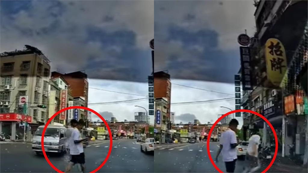 不要命了嗎?「霸王級行人」闖紅燈過馬路+沿路滑手機 囂張畫面曝